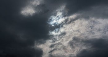 Timelapse clouds sun and dark clouds