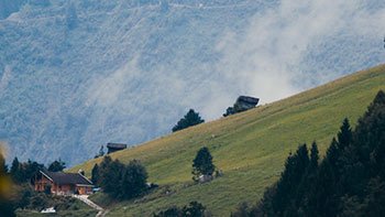 Timelapse teleshot mountain with clouds