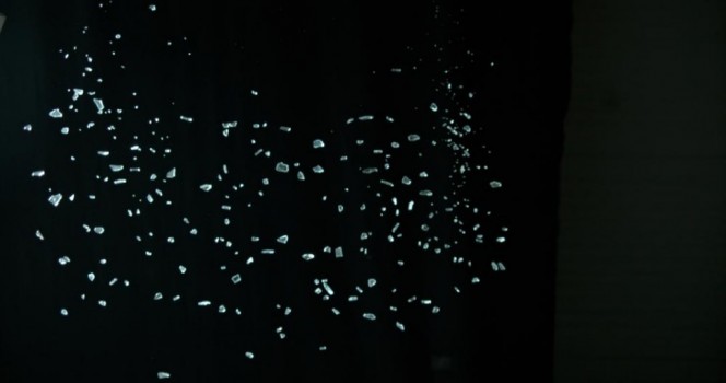 Slowmotion bits of broken glass falling