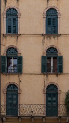 old italian windows wooden with old facade